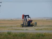 An oil well along the highway in western Saskatchewan.
